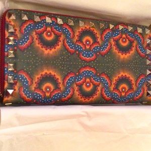 Valentino Garavani continental zip around wallet.